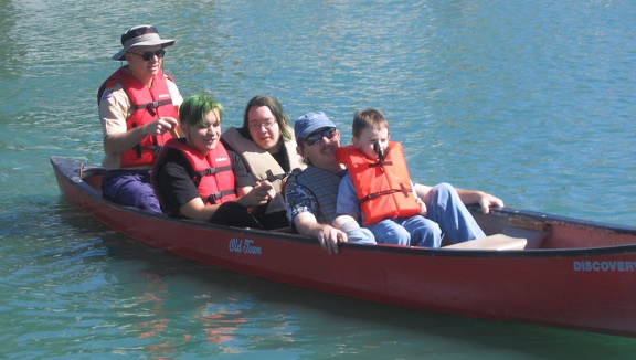 Daniel, Travis, Chris and Nicolas getting a ride around the lake 