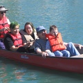 Daniel, Travis, Chris and Nicolas getting a ride around the lake 