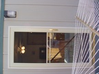 A better shot of the new screen door and view into master bedroom and partially dressed photographer.