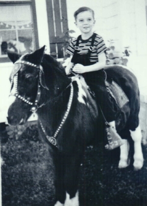 Richard, Jr. (Dick) on a horse